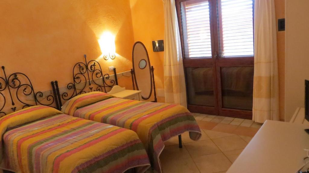 Il Viandante Hotell San Teodoro  Rom bilde